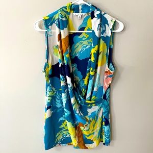 Beautiful sleeveless multi-color blues and yellow sleeveless blouse. Cabi. Med.